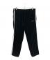 SUPREME（シュプリーム）の古着「Studded Velour Track Pant」｜ブラック