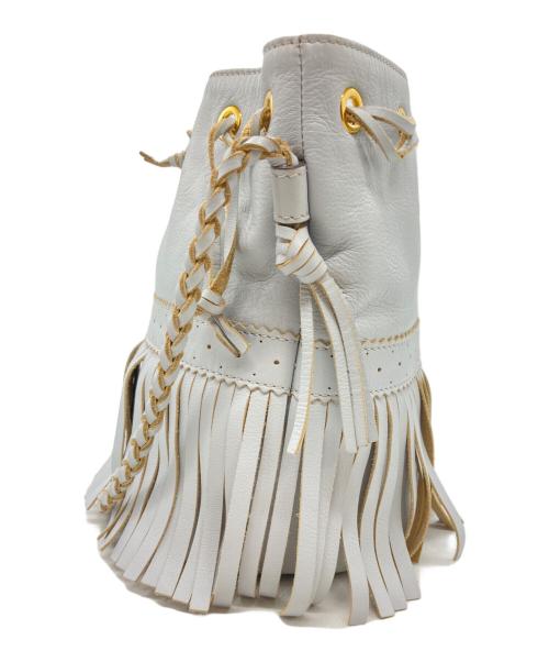 J&M DAVIDSON（ジェイ＆エム デヴィッドソン）J&M DAVIDSON (ジェイ＆エム デヴィッドソン) CARNIVAL フリンジ巾着バッグ ブルーの古着・服飾アイテム