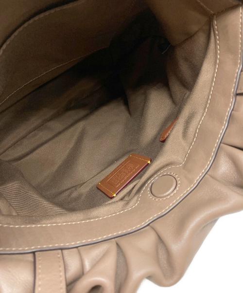 COACH（コーチ）COACH (コーチ) フェイ ドローストリング トート バッグ ブラウン サイズ:下記参照の古着・服飾アイテム