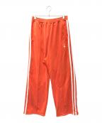 doubletダブレット）の古着「VINTAGE EFFECT TRACK PANTS」｜オレンジ