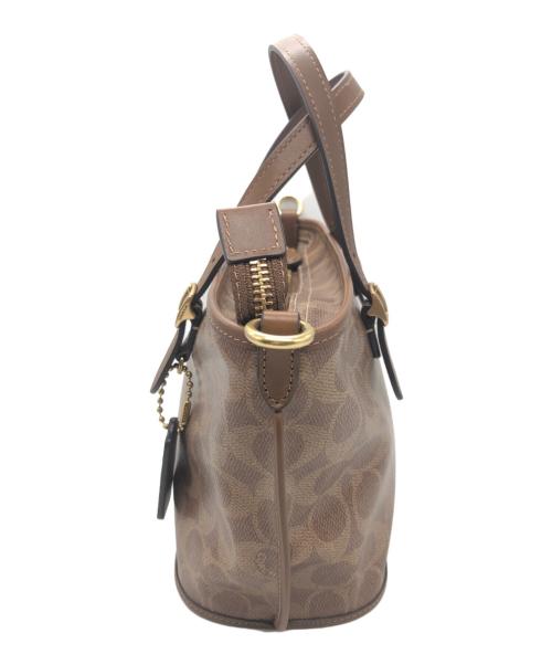 COACH（コーチ）COACH (コーチ) タクシー トート バッグ 21・シグネチャー キャンバス ブラウンの古着・服飾アイテム