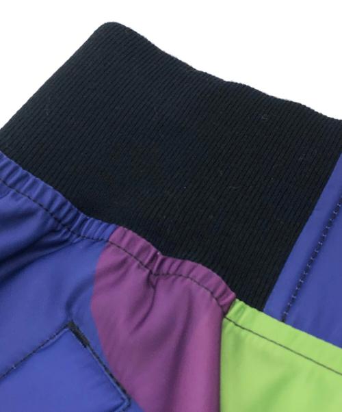 sacai（サカイ）sacai (サカイ) KAWS (カウズ) カモフラサイドジッププリーツスカート ブルー×パープル サイズ:SIZE 0の古着・服飾アイテム