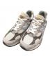 NEW BALANCE（ニューバランス）の古着「ローカットスニーカー」｜グレー×アイボリー