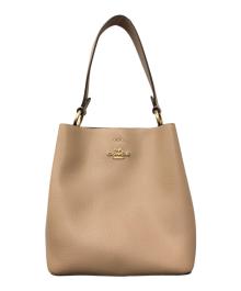 COACH（コーチ）の古着「Small Town Bucket Bag」｜ベージュ