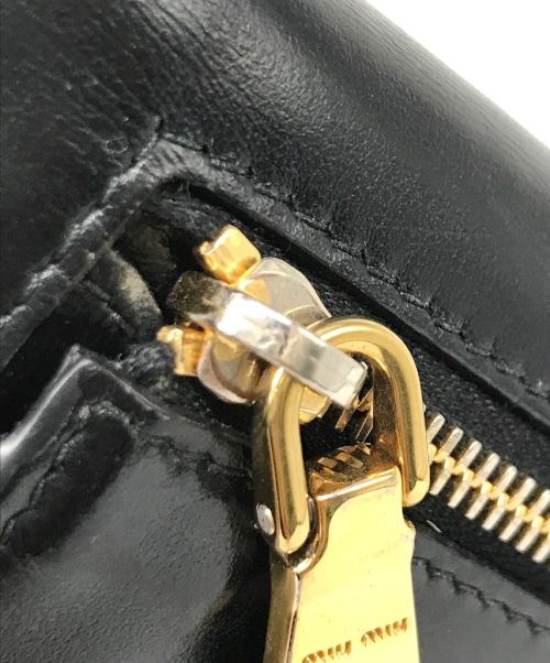 MIU MIU（ミュウミュウ）MIU MIU (ミュウミュウ) リボンフラップロングウォレット ブラックの古着・服飾アイテム