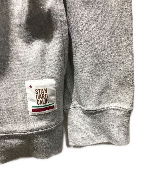 STANDARD CALIFORNIA（スタンダードカリフォルニア）STANDARD CALIFORNIA (スタンダートカルフォニア) GO OUT (ゴーアウト) ロゴパーカー グレー サイズ:Lの古着・服飾アイテム