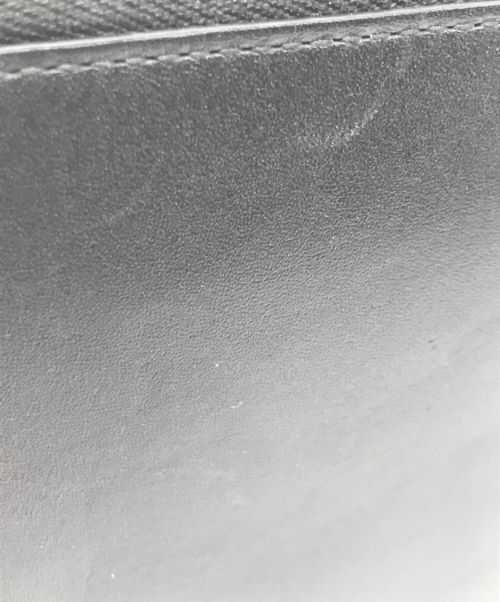 COMME des GARCONS（コムデギャルソン）COMME des GARCONS (コムデギャルソン) 2つ折り財布 ブラックの古着・服飾アイテム