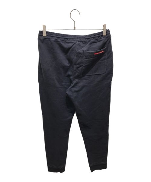 PRADA（プラダ）PRADA (プラダ) ラバータグスウェットパンツ　SJP182 ネイビー サイズ:Sの古着・服飾アイテム