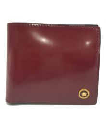 VERSACE（ヴェルサーチェ）の古着「2つ折り財布」｜ボルドー
