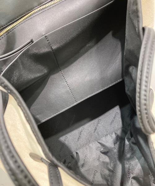 Calvin Klein（カルバンクライン）Calvin Klein (カルバンクライン) リゾート キャンバス トートバッグ アイボリーの古着・服飾アイテム
