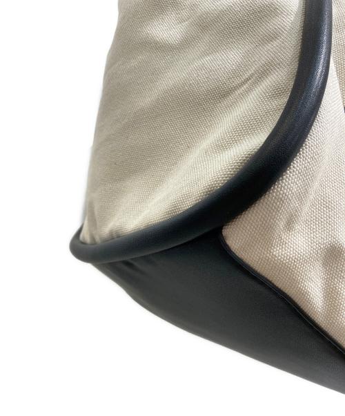 Calvin Klein（カルバンクライン）Calvin Klein (カルバンクライン) リゾート キャンバス トートバッグ アイボリーの古着・服飾アイテム