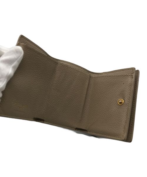 Saint Laurent Paris（サンローランパリ）Saint Laurent Paris (サンローランパリ) オリガミ タイニーウォレット　BND620287 ベージュの古着・服飾アイテム