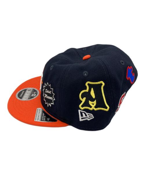 New Era（ニューエラ）New Era (ニューエラ) SAINT MICHAEL (セントマイケル) キャップ　 Retro Crown 9FIFTY ネイビー×オレンジの古着・服飾アイテム