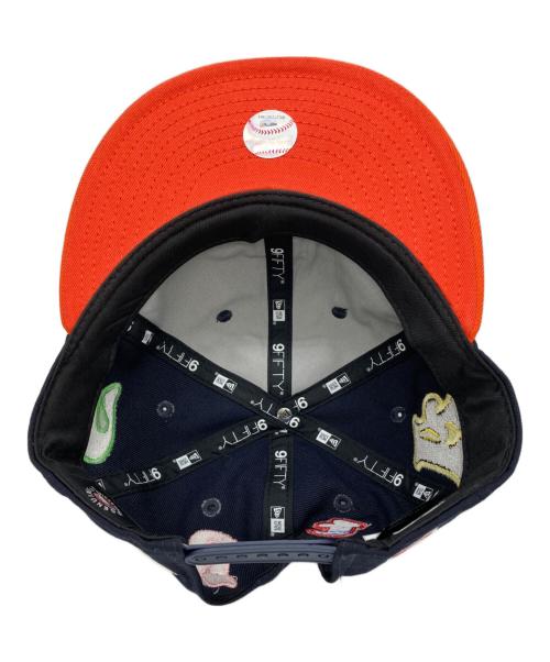 New Era（ニューエラ）New Era (ニューエラ) SAINT MICHAEL (セントマイケル) キャップ　 Retro Crown 9FIFTY ネイビー×オレンジの古着・服飾アイテム