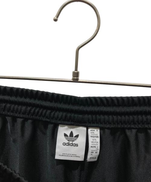 adidas（アディダス）adidas (アディダス) サイドスナップトラックパンツ　NH6098 ブラック サイズ:2XLの古着・服飾アイテム