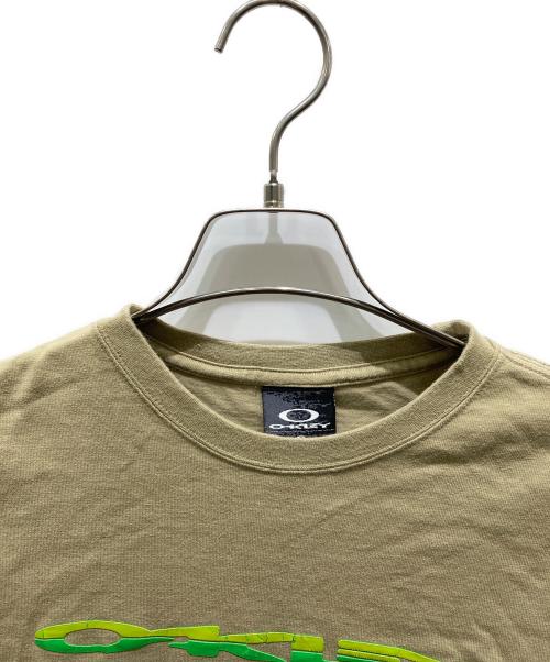 OAKLEY（オークリー）OAKLEY (オークリー) ロゴプリントTシャツ ベージュ サイズ:Sの古着・服飾アイテム