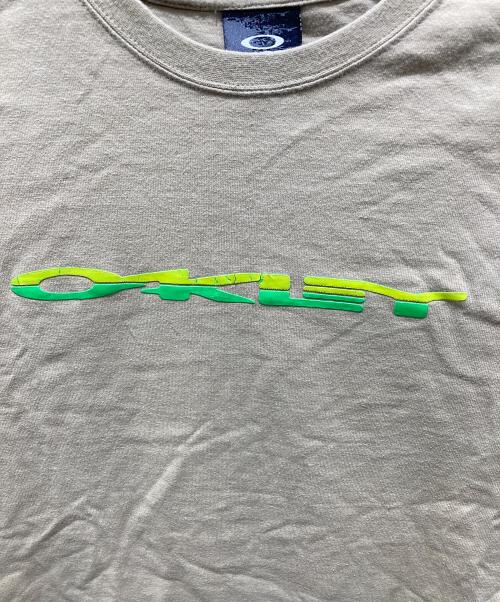 OAKLEY（オークリー）OAKLEY (オークリー) ロゴプリントTシャツ ベージュ サイズ:Sの古着・服飾アイテム