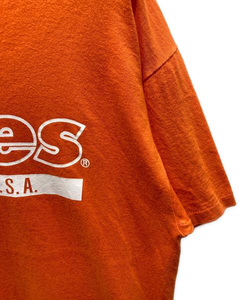 Hanes（ヘインズ）Hanes (ヘインズ) プリントTシャツ オレンジ サイズ:Lの古着・服飾アイテム