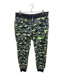 A BATHING APE（ア ベイシング エイプ）の古着「Neon 1st Camo Sweatpants Green/Black」｜Green/Black
