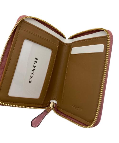 COACH（コーチ）COACH (コーチ) 2つ折り財布 ピンクの古着・服飾アイテム
