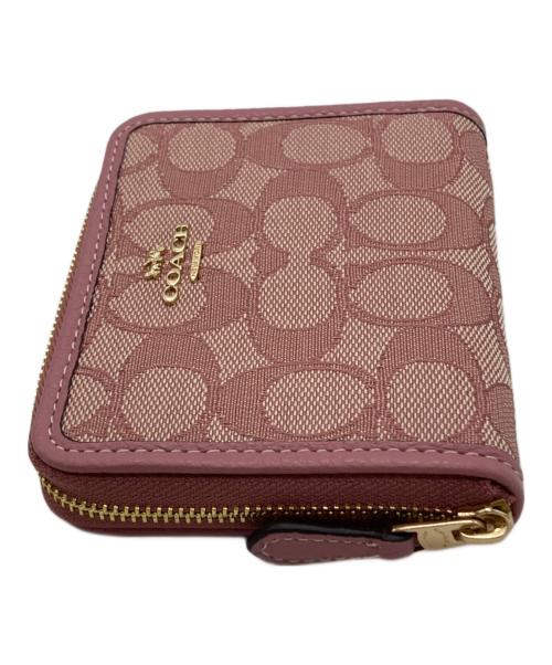 COACH（コーチ）COACH (コーチ) 2つ折り財布 ピンクの古着・服飾アイテム