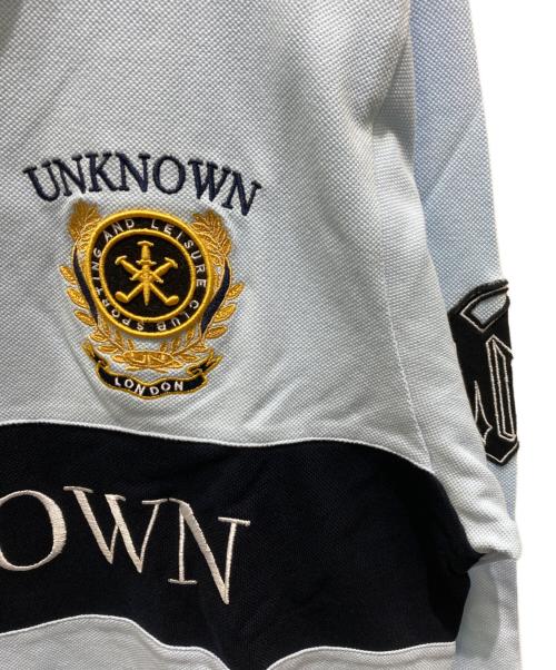 unknown（アンノーン）unknown (アンノウン) ゴルフアカデミー LSポロシャツ スカイブルー サイズ:XL 未使用品の古着・服飾アイテム