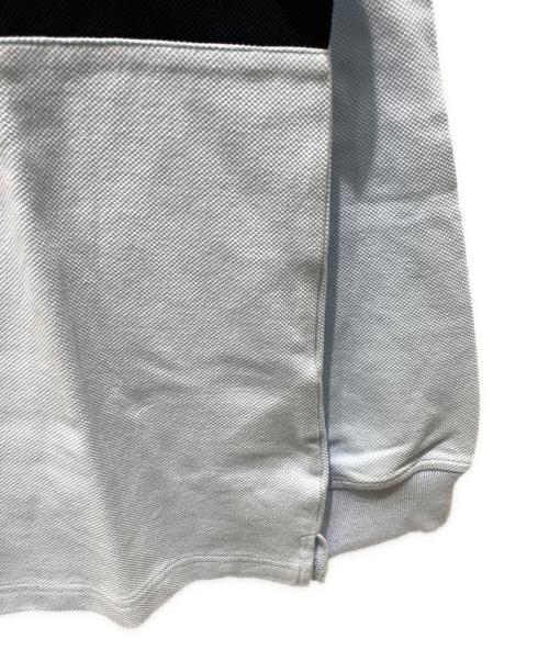 unknown（アンノーン）unknown (アンノウン) ゴルフアカデミー LSポロシャツ スカイブルー サイズ:XL 未使用品の古着・服飾アイテム