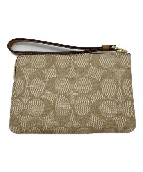 COACH（コーチ）COACH (コーチ) シグネチャーポーチ ベージュ 未使用品の古着・服飾アイテム