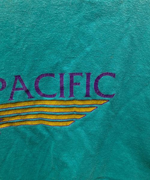 Ocean Pacific（オーシャンパシフィック）Ocean Pacific (オーシャンパシフィック) プリントTシャツ ブルー サイズ:XLの古着・服飾アイテム