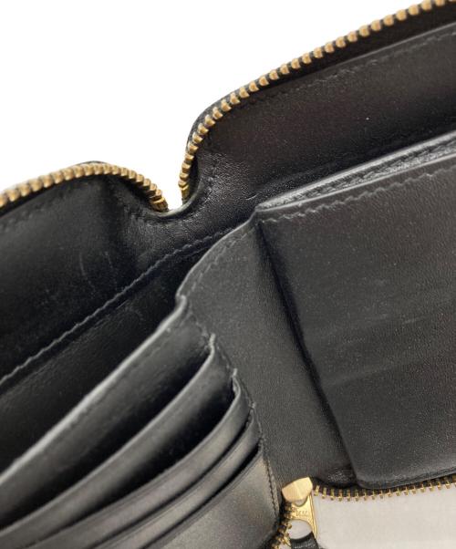 COMME des GARCONS（コムデギャルソン）COMME des GARCONS (コムデギャルソン) ラウンドファスナー財布 ブラックの古着・服飾アイテム