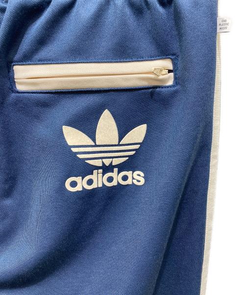 adidas（アディダス）adidas (アディダス) グラフィックス メローライドクラブ ベッケンバウアー トラックパンツ ネイビー サイズ:Ⅼの古着・服飾アイテム