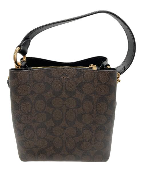 COACH（コーチ）COACH (コーチ) スモール タウン バケット バッグ シグネチャー キャンバス ブラウンの古着・服飾アイテム