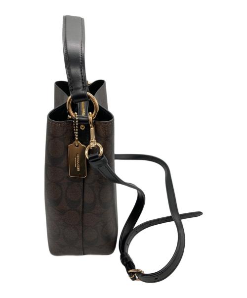COACH（コーチ）COACH (コーチ) スモール タウン バケット バッグ シグネチャー キャンバス ブラウンの古着・服飾アイテム