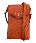 MICHAEL KORSマイケル・コース）の古着「コイン フォーン クロスボディ」｜オレンジ