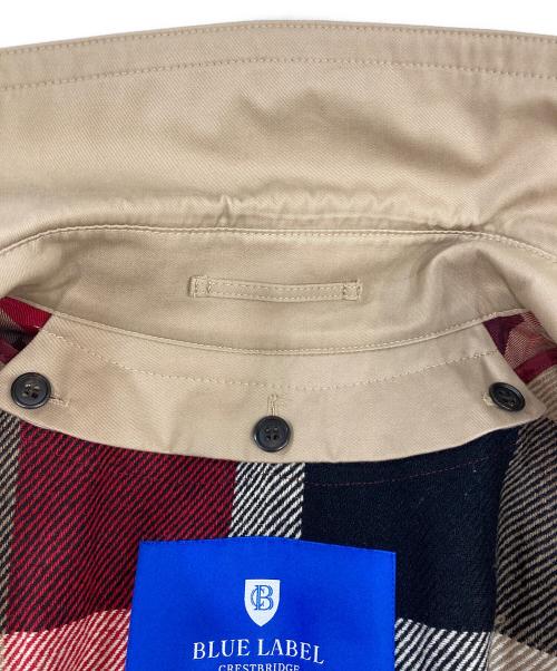 BLUE LABEL CRESTBRIDGE（ブルーレーベルクレストブリッジ）BLUE LABEL CRESTBRIDGE (ブルーレーベルクレストブリッジ) トレンチコート　55A10-400-42 ベージュ サイズ:38の古着・服飾アイテム