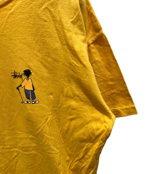 stussy（ステューシー）stussy (ステューシー) シャドーマンプリントTシャツ イエロー サイズ:XLの古着・服飾アイテム