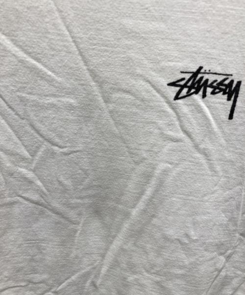 stussy（ステューシー）stussy (ステューシー) スカル×トランププリントTシャツ ホワイト サイズ:XLの古着・服飾アイテム