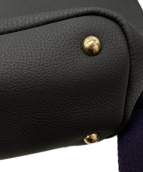 MAGNUM（マグナム）MAGNUM (マグナム) シュリンクレザー リュックサック ネイビーの古着・服飾アイテム