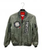 A BATHING APE×UNDEFEATEDア ベイシング エイプ×アンディフィーテッド）の古着「MA-1 ワッペン装飾フライトジャケット」｜カーキ