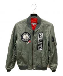 A BATHING APE×UNDEFEATED（ア ベイシング エイプ×アンディフィーテッド）の古着「MA-1 ワッペン装飾フライトジャケット」｜カーキ