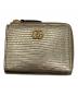 GUCCI（グッチ）の古着「リザードコンパクトウォレット」｜ゴールド
