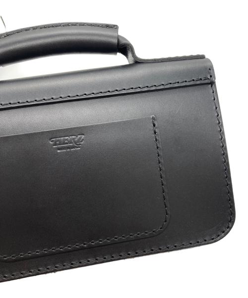 Herz（ヘルツ）Herz (ヘルツ) 二本ベルトの2wayミニバッグ ブラックの古着・服飾アイテム