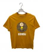 COACH×PEANUTSコーチ×ピーナッツ）の古着「プリントTシャツ」｜イエロー