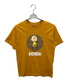 COACH×PEANUTS（コーチ×ピーナッツ）の古着「プリントTシャツ」｜イエロー
