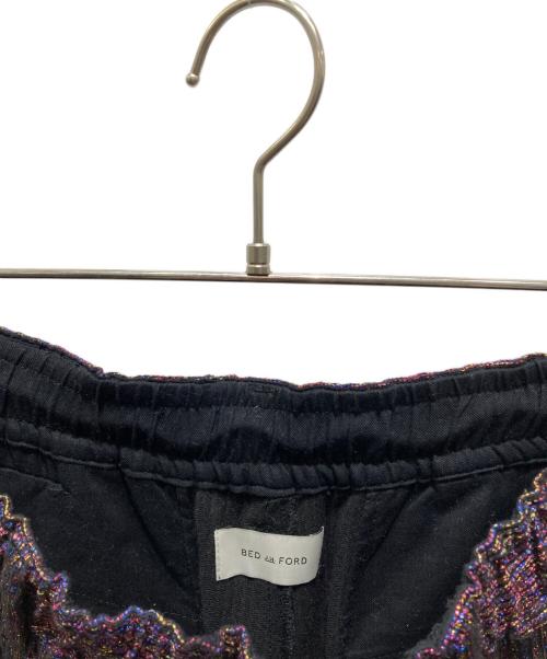 BED J.W. FORD（ベッドフォード）BED J.W. FORD (ベッドフォード) Glitter Flare Pants パープル サイズ:1の古着・服飾アイテム