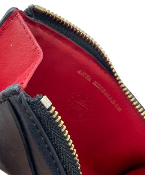 ANYA HINDMARCH（アニヤ・ハインドマーチ）ANYA HINDMARCH (アニヤ・ハインドマーチ) フラグメントケース ネイビーの古着・服飾アイテム