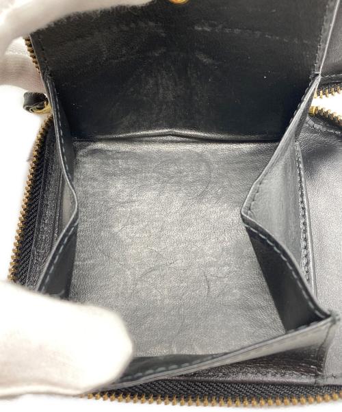 COMME des GARCONS（コムデギャルソン）COMME des GARCONS (コムデギャルソン) ラウンドファスナー財布 ブラックの古着・服飾アイテム