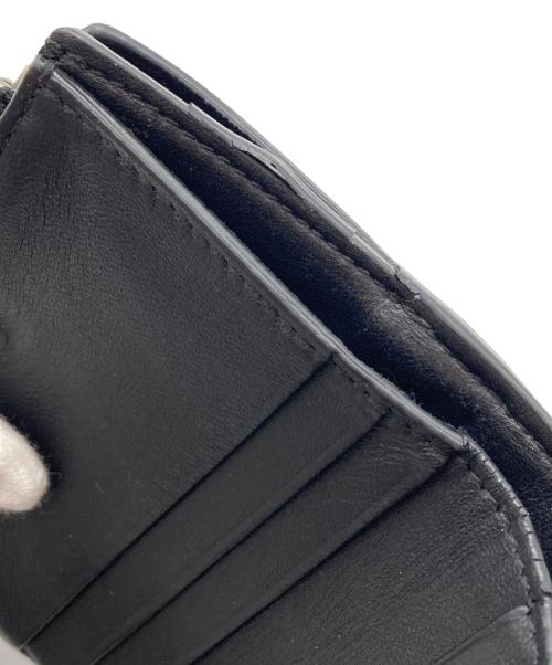 ALEXANDER McQUEEN（アレキサンダーマックイーン）ALEXANDER McQUEEN (アレキサンダーマックイーン) レザー2つ折り財布 ブラックの古着・服飾アイテム