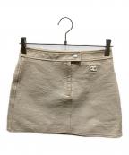 courregesクレージュ）の古着「REEDITION VINYL MINI SKIRT」｜ベージュ