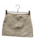 courreges（クレージュ）の古着「REEDITION VINYL MINI SKIRT」｜ベージュ